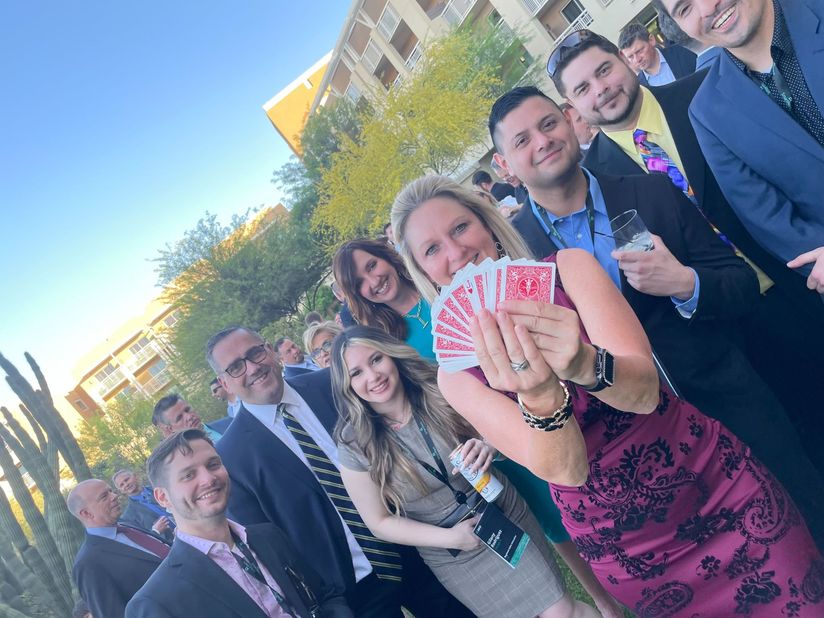 SmartRent team members enjoy a card game.