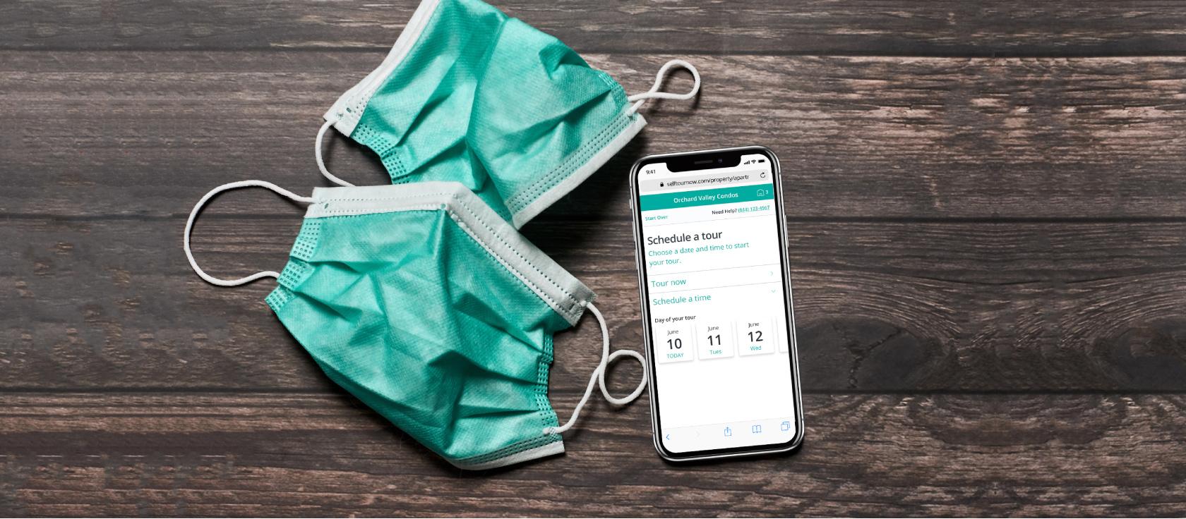 Face masks and cellphone on desk