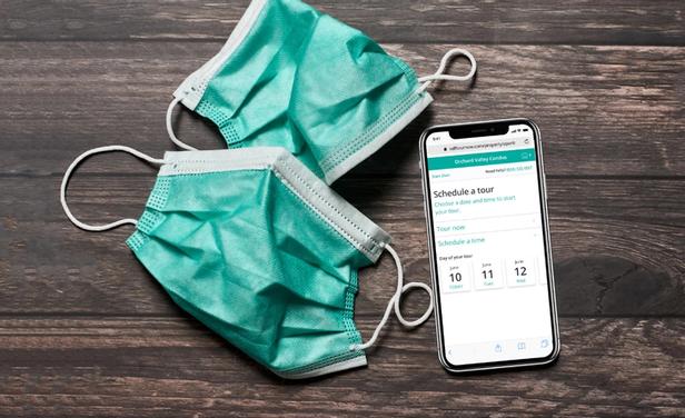 Face masks and cellphone on desk 