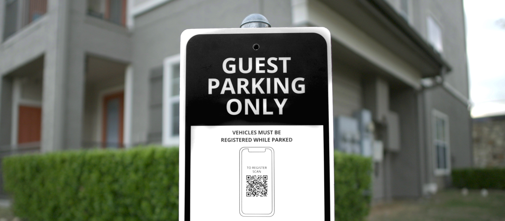 image of smartrent guest parking sign in front of property